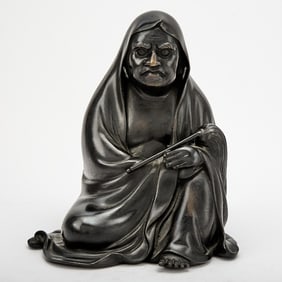 A Japanese Bronze Okimono of Daruma Signed Masayuki, Meiji Period