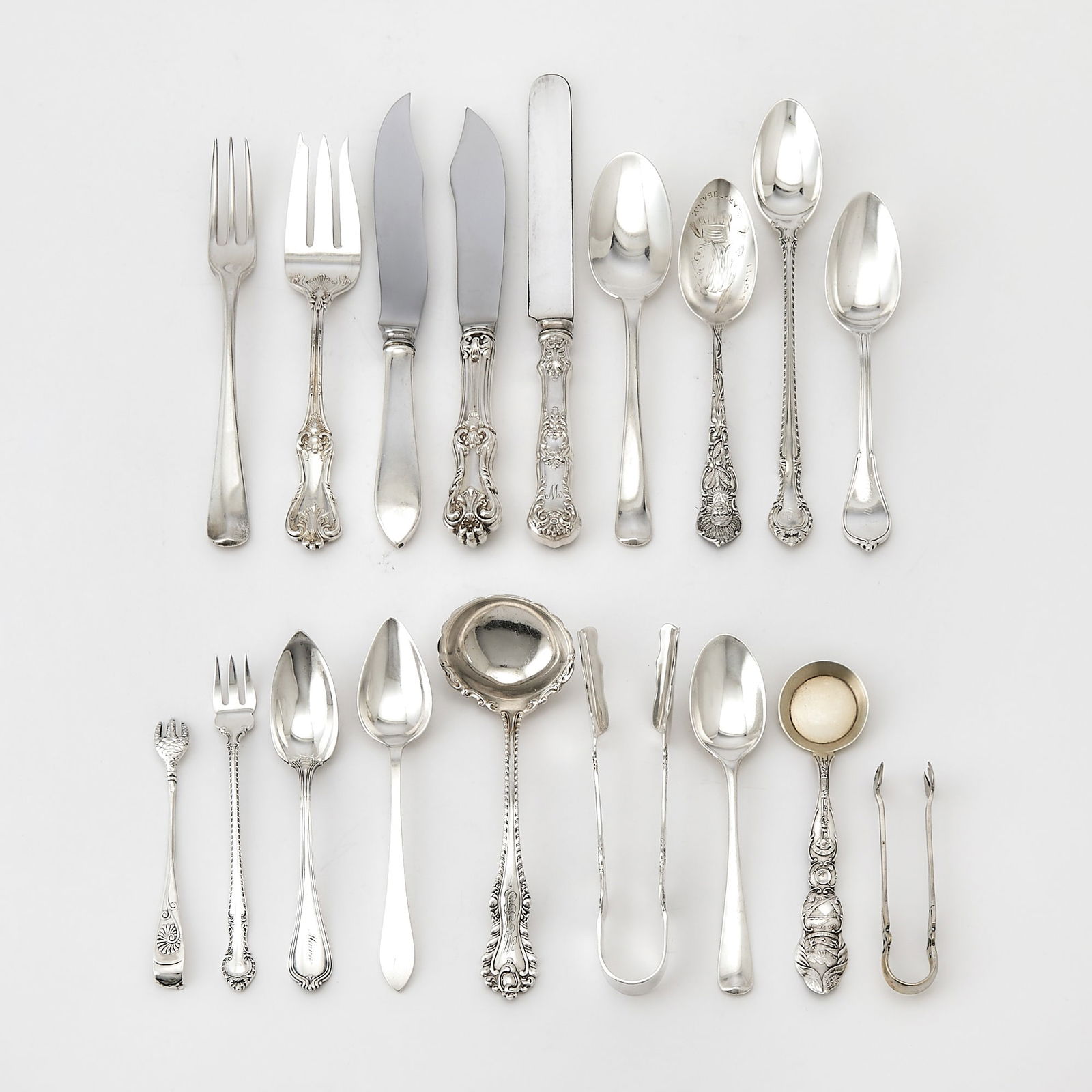 Group of Silver Flatware: Comprising twelve sterling silver fish forks and eleven fish knives, with stainless steel blades, marked Frank Smith Silver Co., together with assorted sterling silver pieces, various patterns and mak