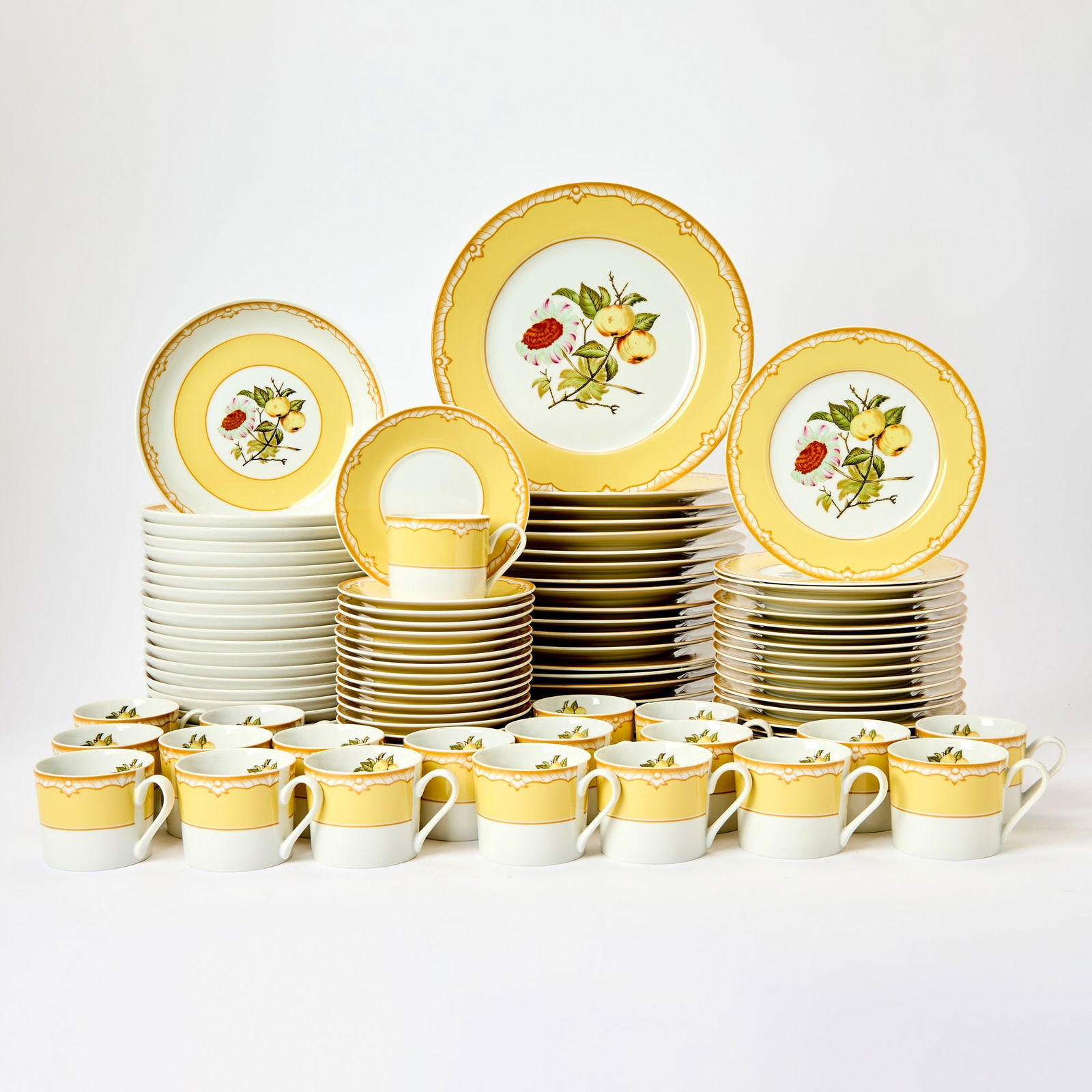 Georges Briard Porcelain "Somerset" Pattern Dinner Service for Twenty: 20th Century Floral decorated with a wide yellow border, comprising: Twenty dinner plates, diameter 10 1/4 inches Twenty soup bowls Twenty salad plates Twenty cups Twenty cup saucers