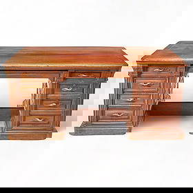 English Mahogany Partner's Desk: Early 20th century Each side with seven drawers including a file drawer on the right side. Height 31 inches, width 72 inches, depth 48 inches Provenance: Cornelius Vanderbilt Whitney (1899 – 199