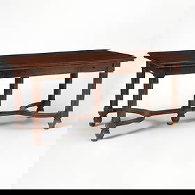 American Victorian Mahogany Partner's Writing Table: Late 19th century With drawers on both sides, brass nailhead trim around the edge. Height 31 inches, width 71 1/2 inches, depth 36 inches. heavily distressed finish, shrinkage at joints,