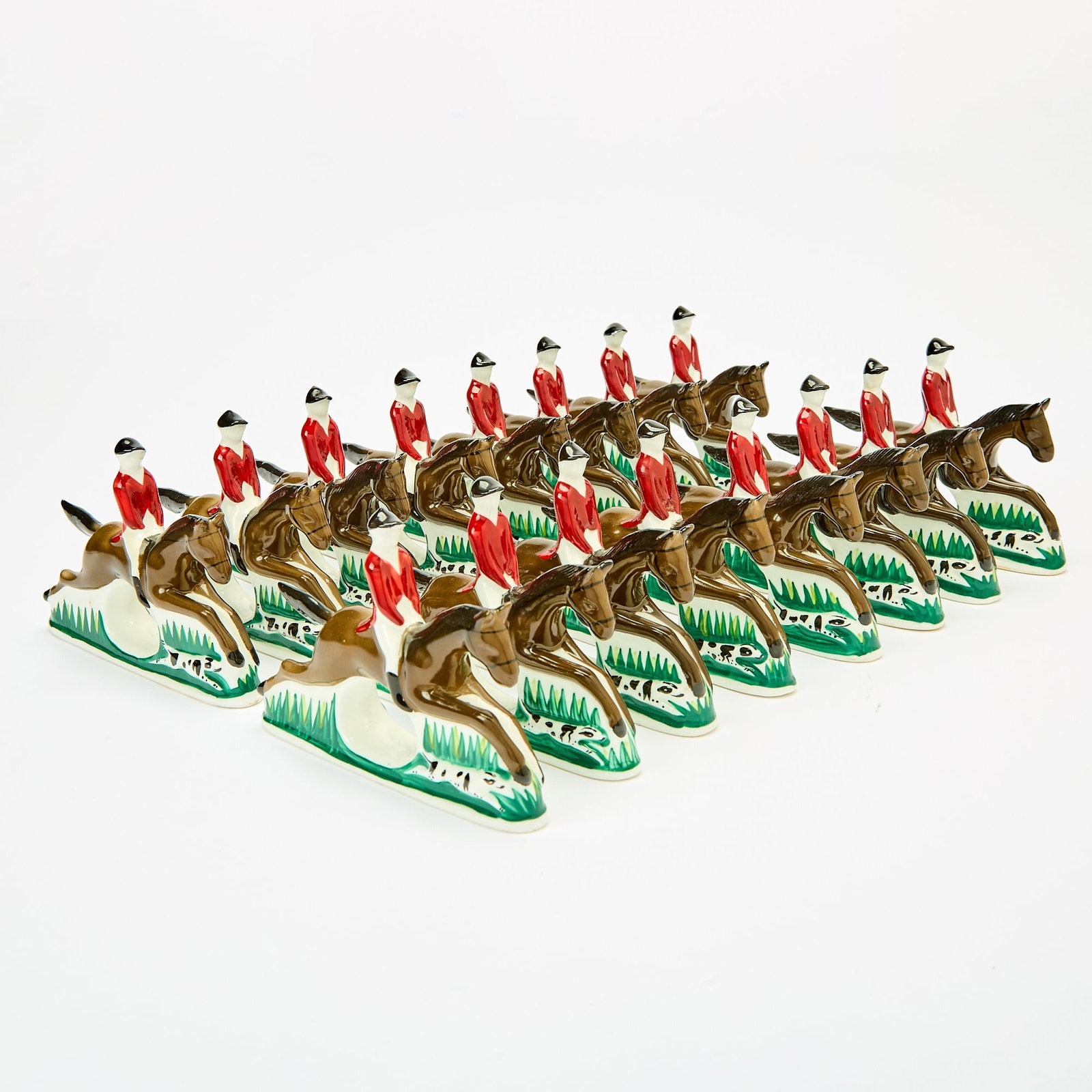 Set of Sixteen Pia Bone China Equestrian Napkin Rings: Stamped Pia Bone China, Philippines, RPA 1985. Height 4 inches, width 6 inches, depth 1 inch. Good condition