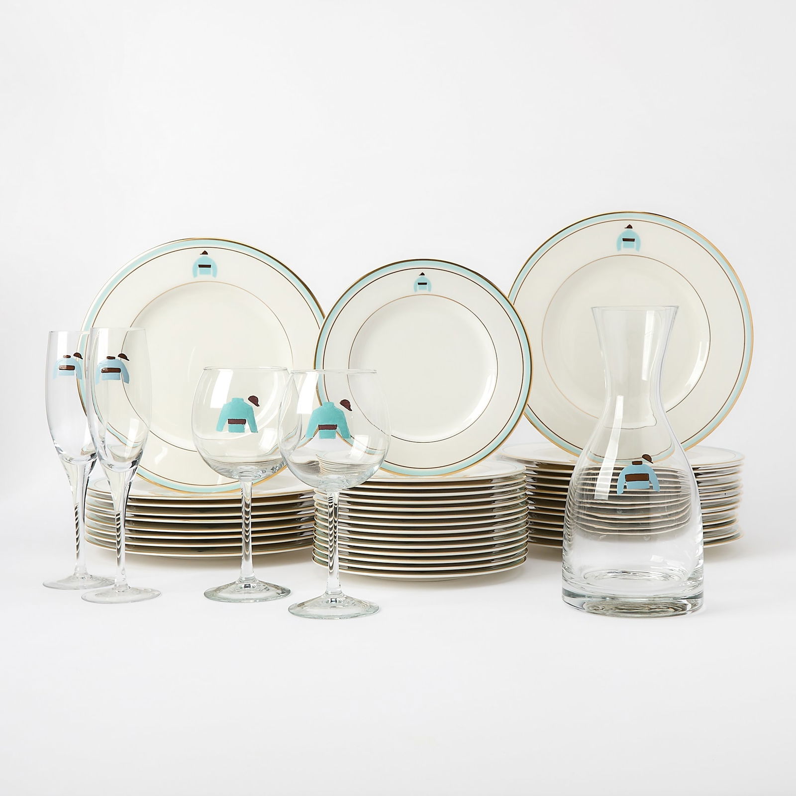 Pickard China Part Dinner Service Decorated with Whitney Silks Logo: Together with a Set of Glassware Comprising twenty-six dinner plates, diameter 10 1/2 inches; twenty-five salad plates; four matching champage glasses; six slightly larger matching champagne glasses;
