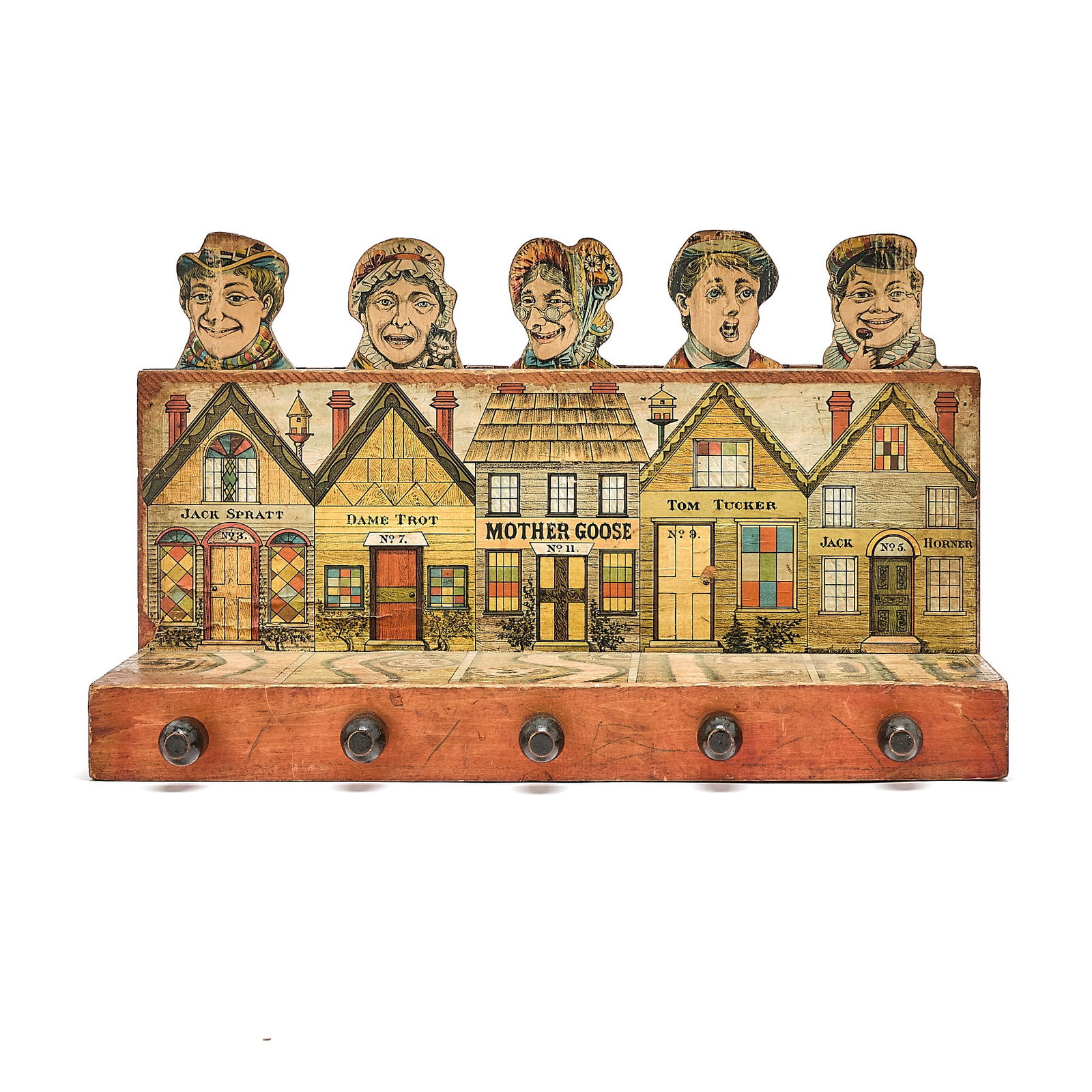 A carnival ball-toss style game featuring characters from nursery rhymes: GAMES [Charles Crandall] A Nursery Rhyme/Fairy Tale Themed Carnival Game, with Mother Goose, Jack Sprat, Dame Trot and others. Circa 1900. Wooden base and levers, chromolithography. A ball-toss type g