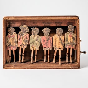 1890s crank toy of dancers on stage