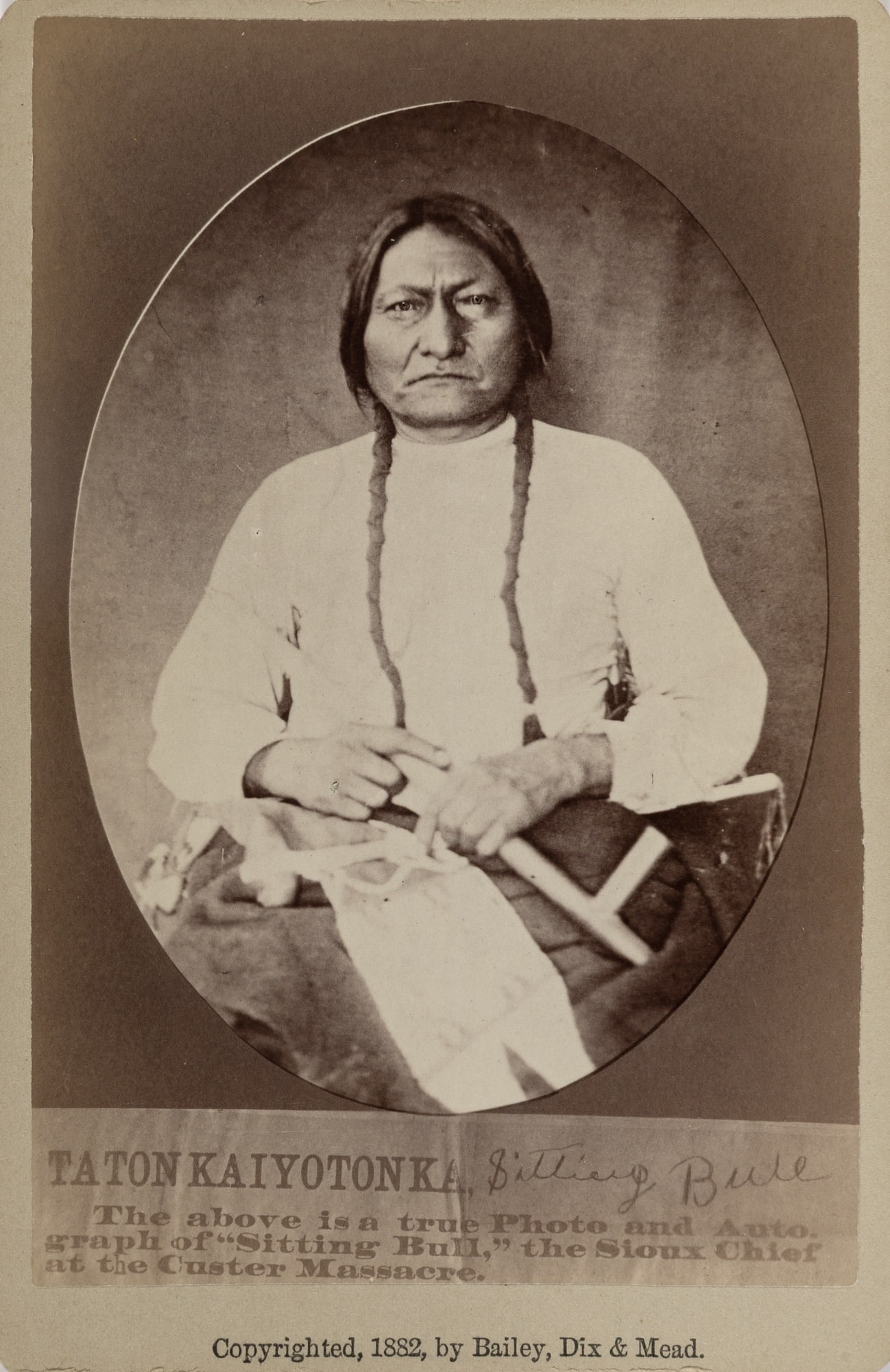 A cabinet card of Sitting Bull: [NATIVE AMERICANS] [BAILEY, DIX & MEAD]. A cabinet card of Lakota Chief Sitting Bull. Albumen print, mounted on publisher's card, dated 1882. The verso bears a biographical sketch of Sitting Bull 