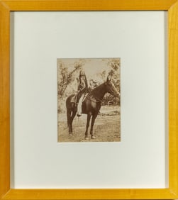 A rare photograph of a Comanche Chief Quanah Parker on horseback