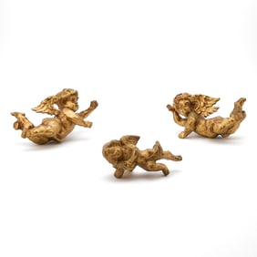 Group of Three Continental Baroque Style Carved Giltwood Cherubs