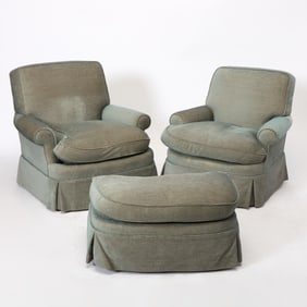 Two Upholstered Club Chairs and an Ottoman en Suite