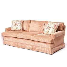 Pink Upholstered Sofa with Two Pillows