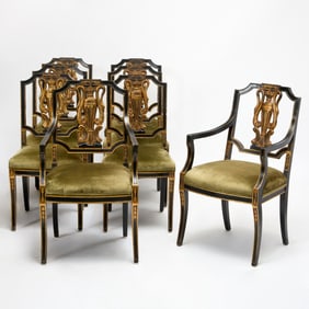 Set of Eight Italian Neoclassical Style Parcel Gilt and Ebonized Wood Dining Chairs