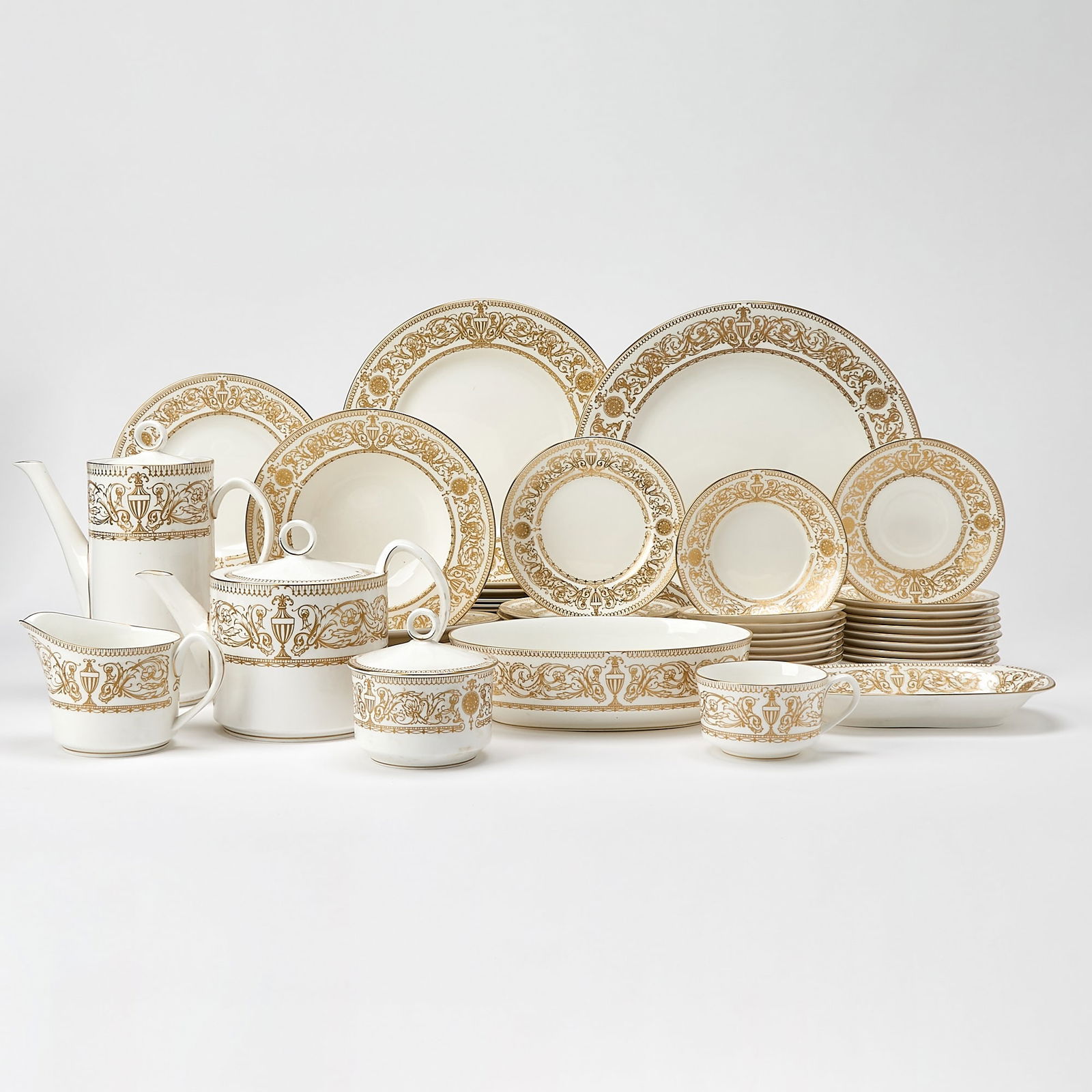 Royal Worcester Porcelain "Hyde Park "Pattern Part Dinner Service: Designed in 1966 Comprising: Ten dinner plates, diameter 10 5/8 inches Ten salad/dessert plates, diameter 7 7/8 inches Ten rim soup bowls, diameter 8 1/8 inches Ten bread and butter plates<