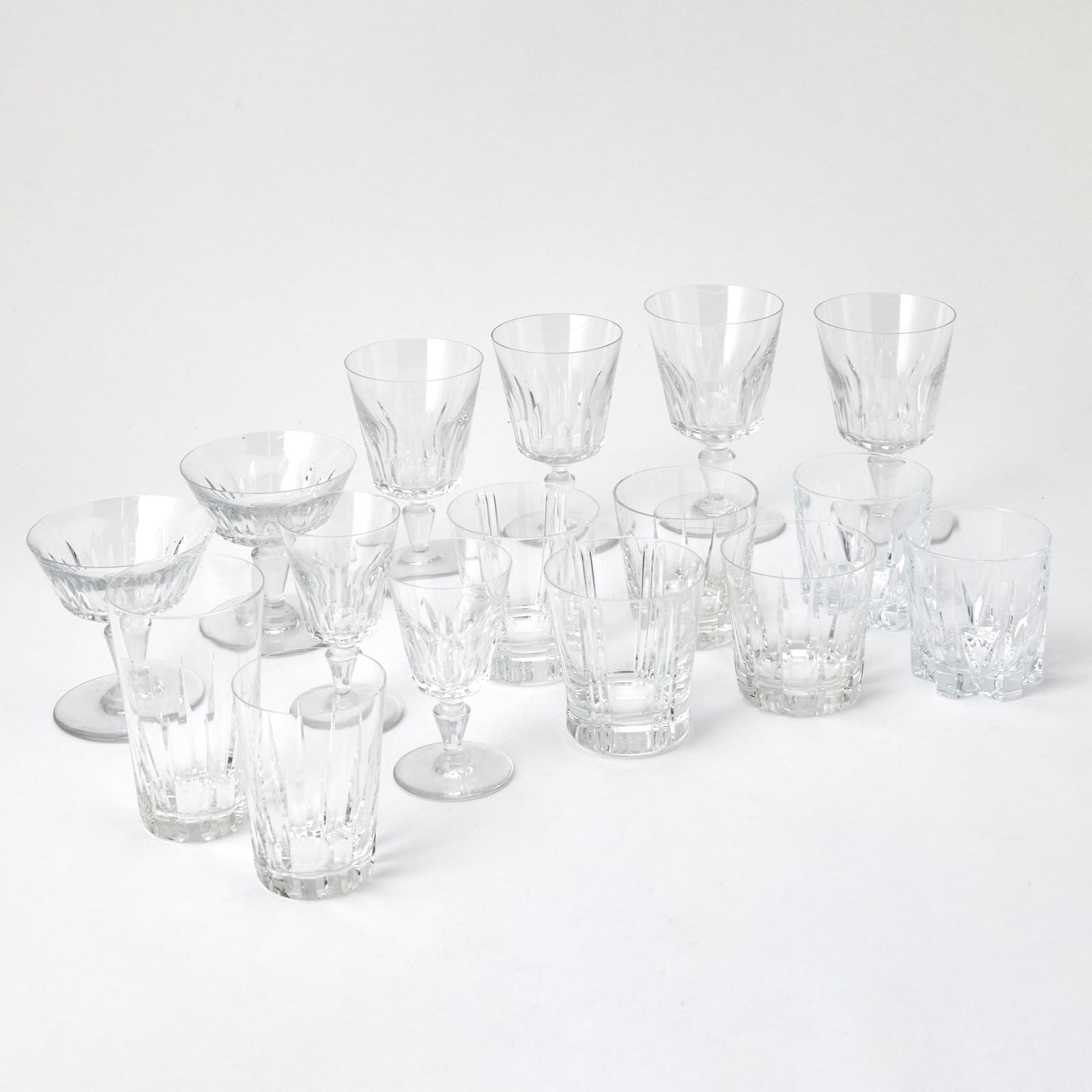 Baccarat Glass "Biarritz" Pattern Part Stemware Service: Comprising: Three water goblets, height 6 inches Twelve red wine glasses, height 5 3/4 inches Ten champagne coupes, height 4 1/4 inches Twelve cordial glasses, height 3 1/8 inches