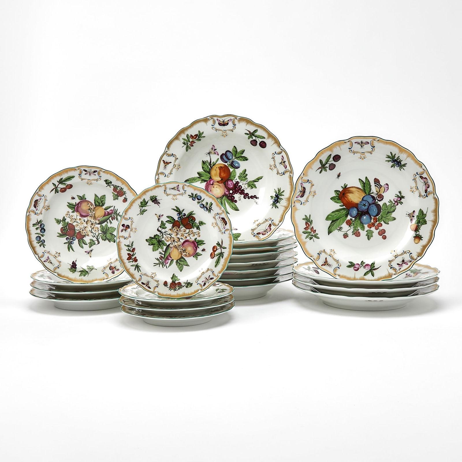 Mottahedeh Porcelain "Duke of Gloucester" Pattern Part Dinner Service: Comprising: Thirteen dinner plates, diameter 10 1/8 inches Eleven rim soup bowls, diameter 10 1/4 inches