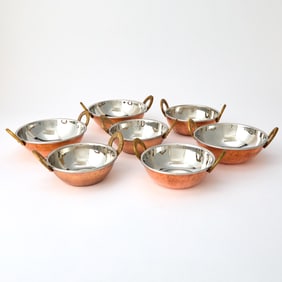 Seven Two-Handled Copper Bowls