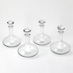 Set of Four Blown Glass Decanters and Stoppers