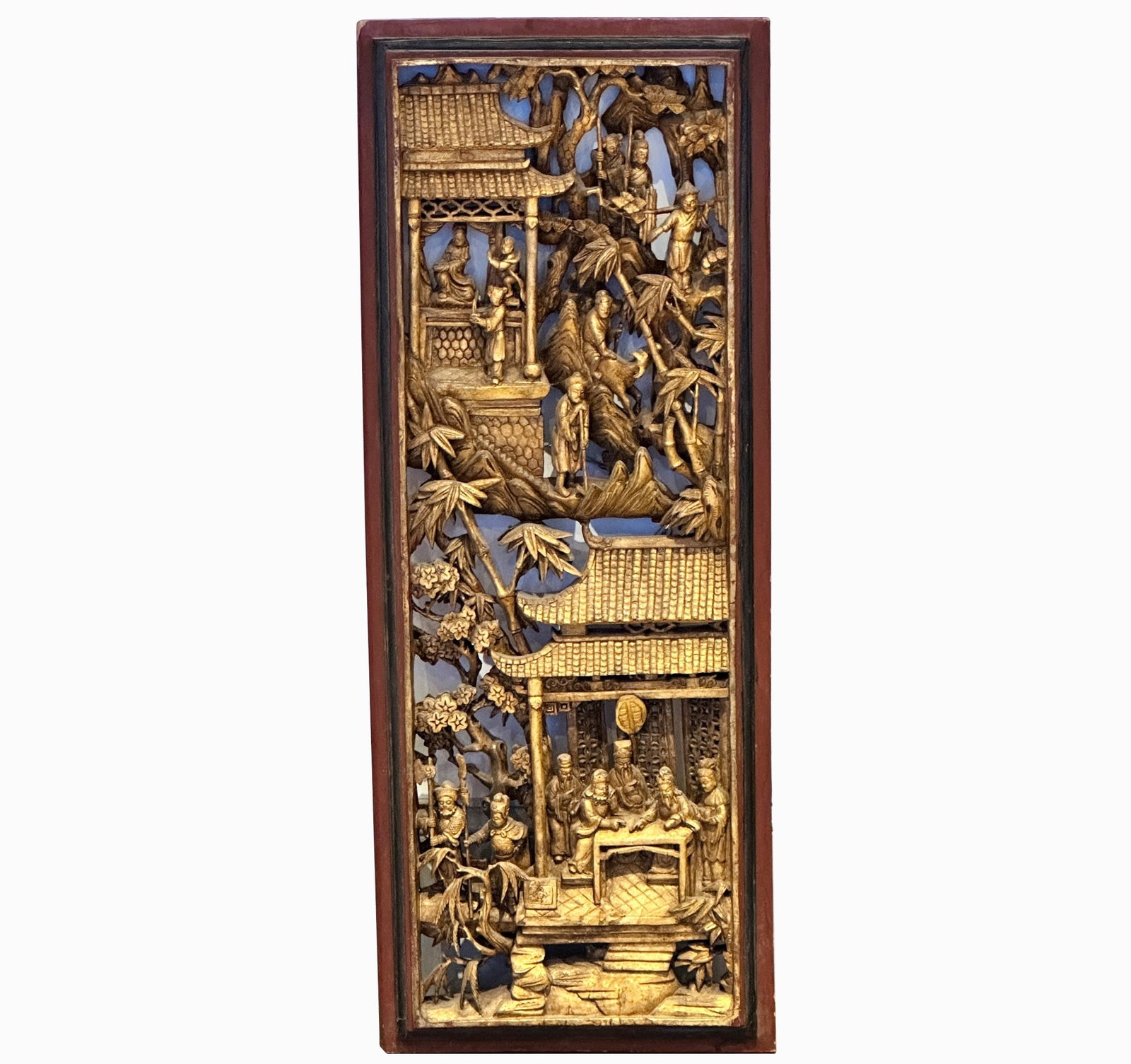 Carved Pierced and Parcel Gilt-Wood Panel: China, early 20th century Depicting figures engaged in various pursuits. Height 41 inches, width 15 1/2 inches.