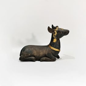 Carved Wood and Parcel Gilt Figure of a Recumbent Deer
