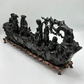 Chinese Horizontally-Oriented Ebonized Wood Sculpture of Immortals on a Wooden Stand