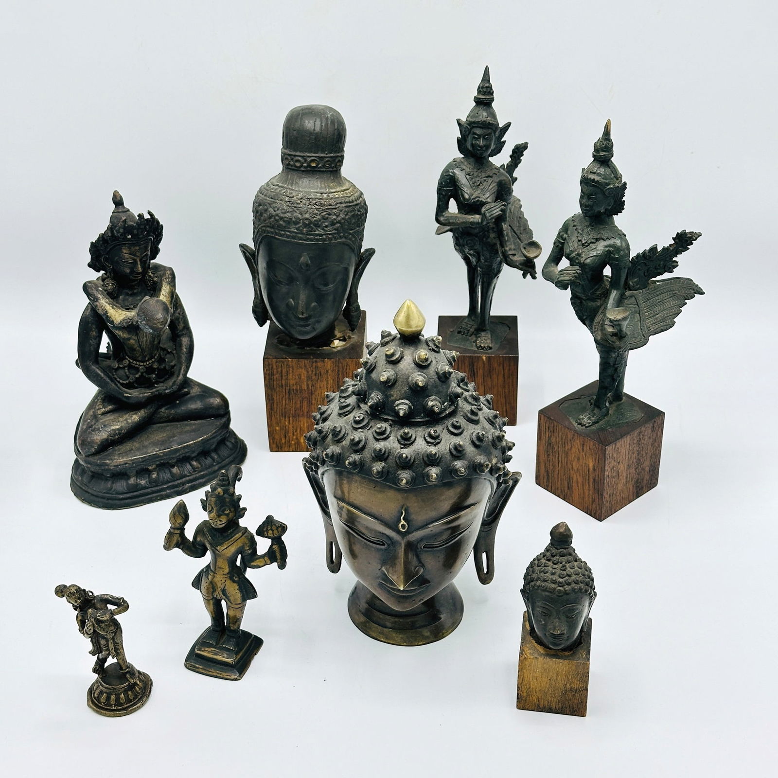 Group of Eight Bronze Figures: Height of pair overall 10 1/2 inches.