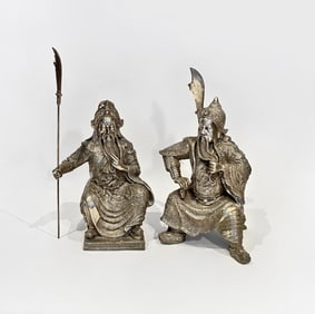 Pair of Silvered White Metal Figural Sculptures of Warriors