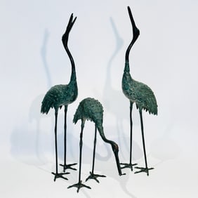 Three Patinated Metal Figures of Cranes