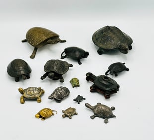 Fifteen Cast Bronze or Carved Hardwood Turtles