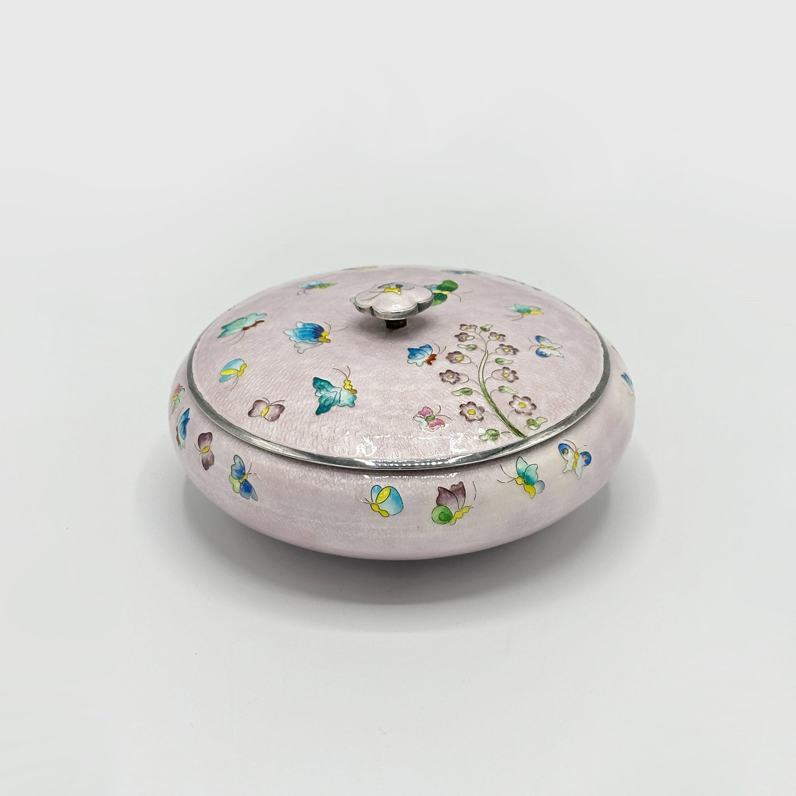 Korean 999 Silver and Enamel Box and Cover: Decorated with flowers and butterflies. Diameter 5 1/4 inches, approximately 12 ounces, all in.
