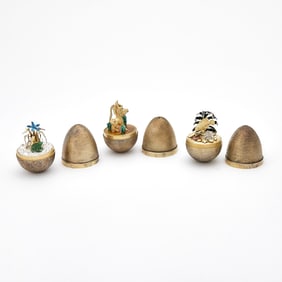 Three Stuart Devlin Sterling Silver Gilt and Enamel Suprise Eggs