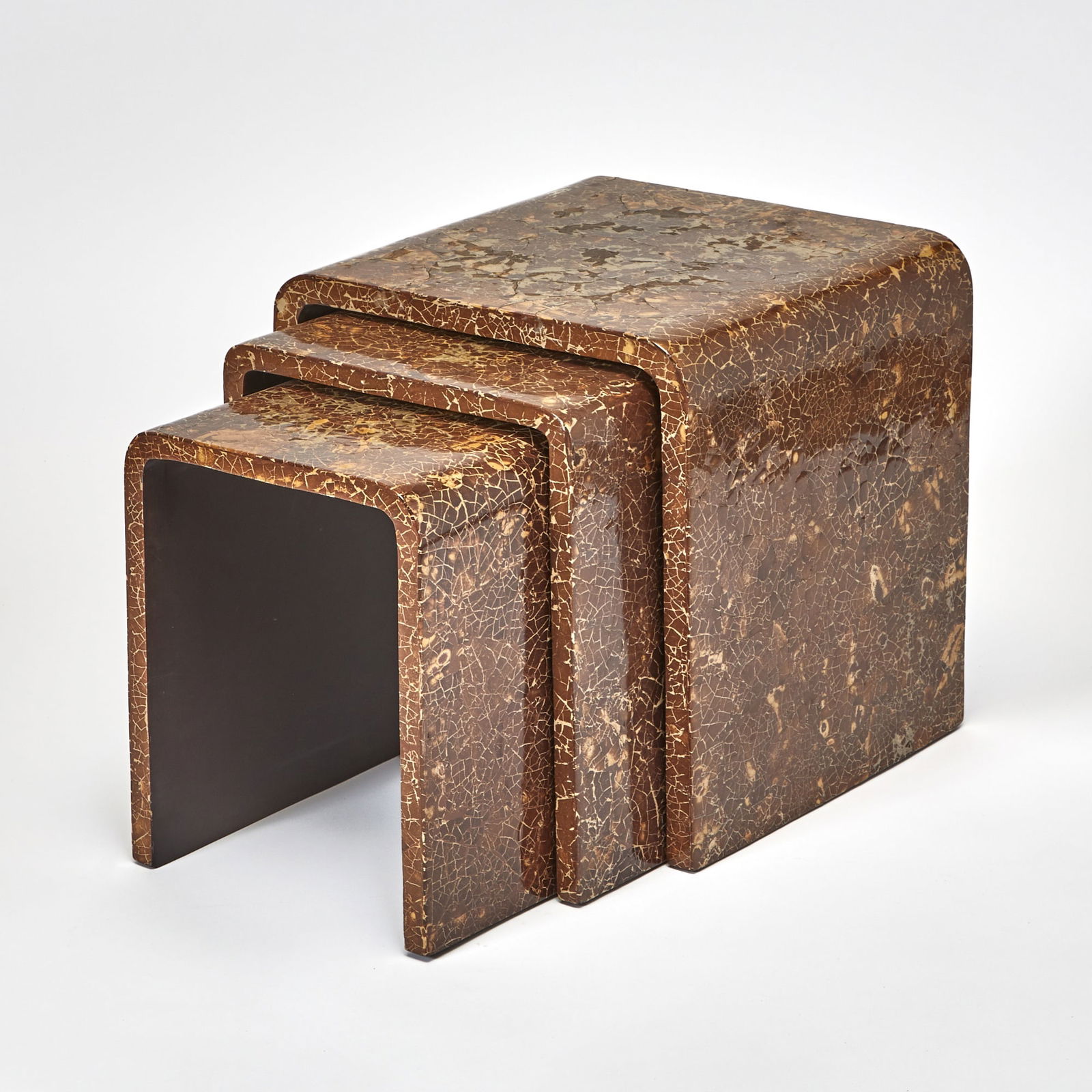 Nest of Three Coconut Shell Lacquered Tables: 1970s/1980s Height of largest 19 1/2 inches, width 17 1/4 inches, depth 17 1/4 inches.