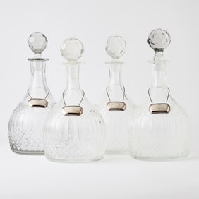 Set of Four Pressed Glass Decanters