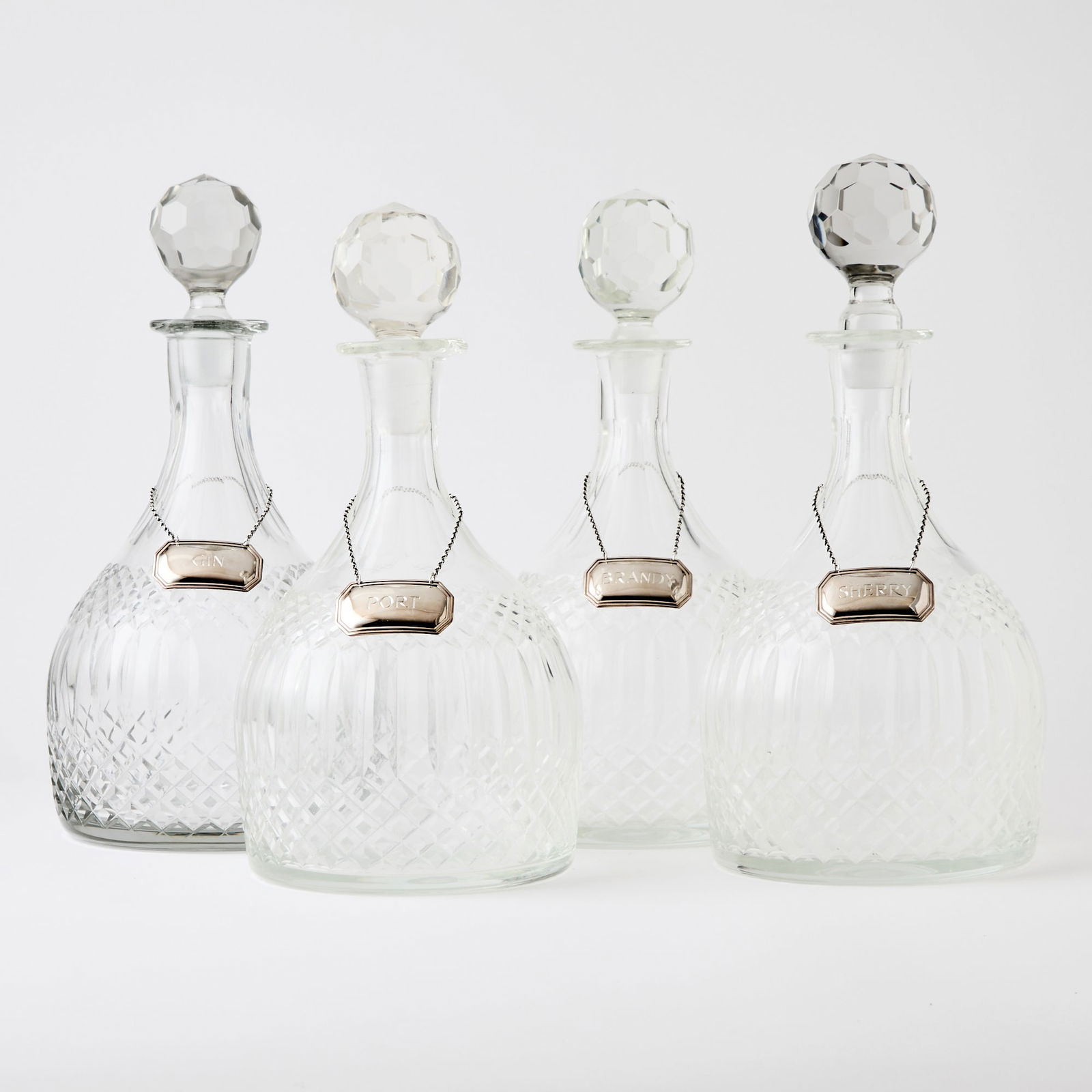Set of Four Pressed Glass Decanters (1 of 4)