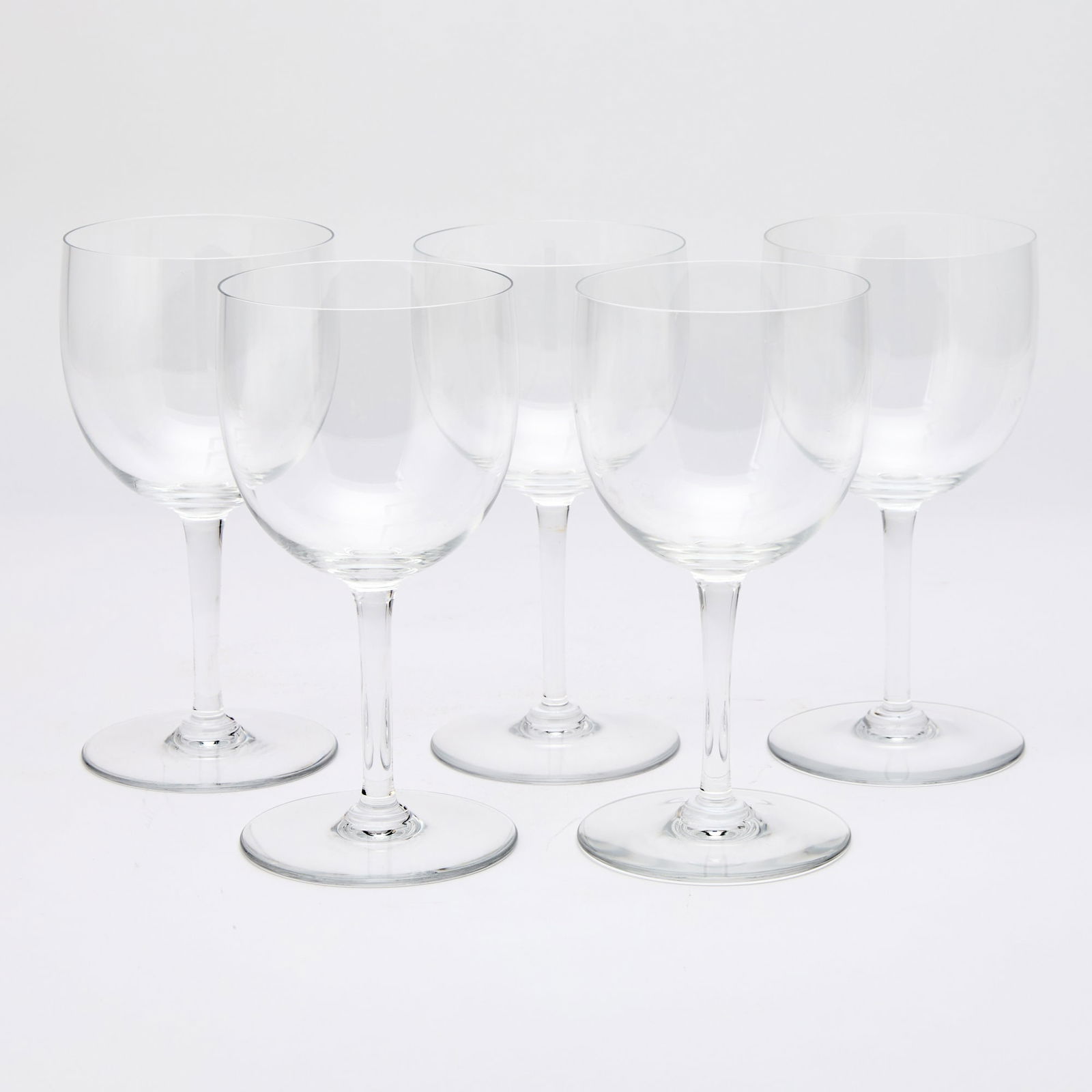 Set of Five Baccarat Glass "Montaigne" Pattern Water Goblets: Each bowl on a tapering thick stem and circular foot, with etched maker's mark. Height 7 inches.