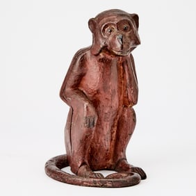 Red-Painted Cast-Iron Figure of a Monkey