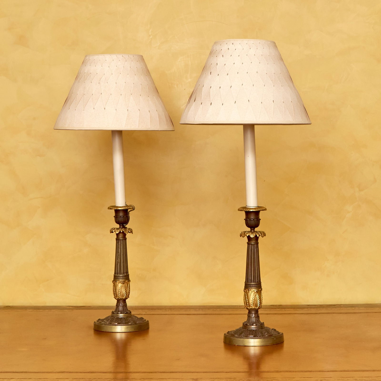 Pair of Neoclassical Style Gilt and Patinated Bronze Candlestick Lamps (1 of 1)