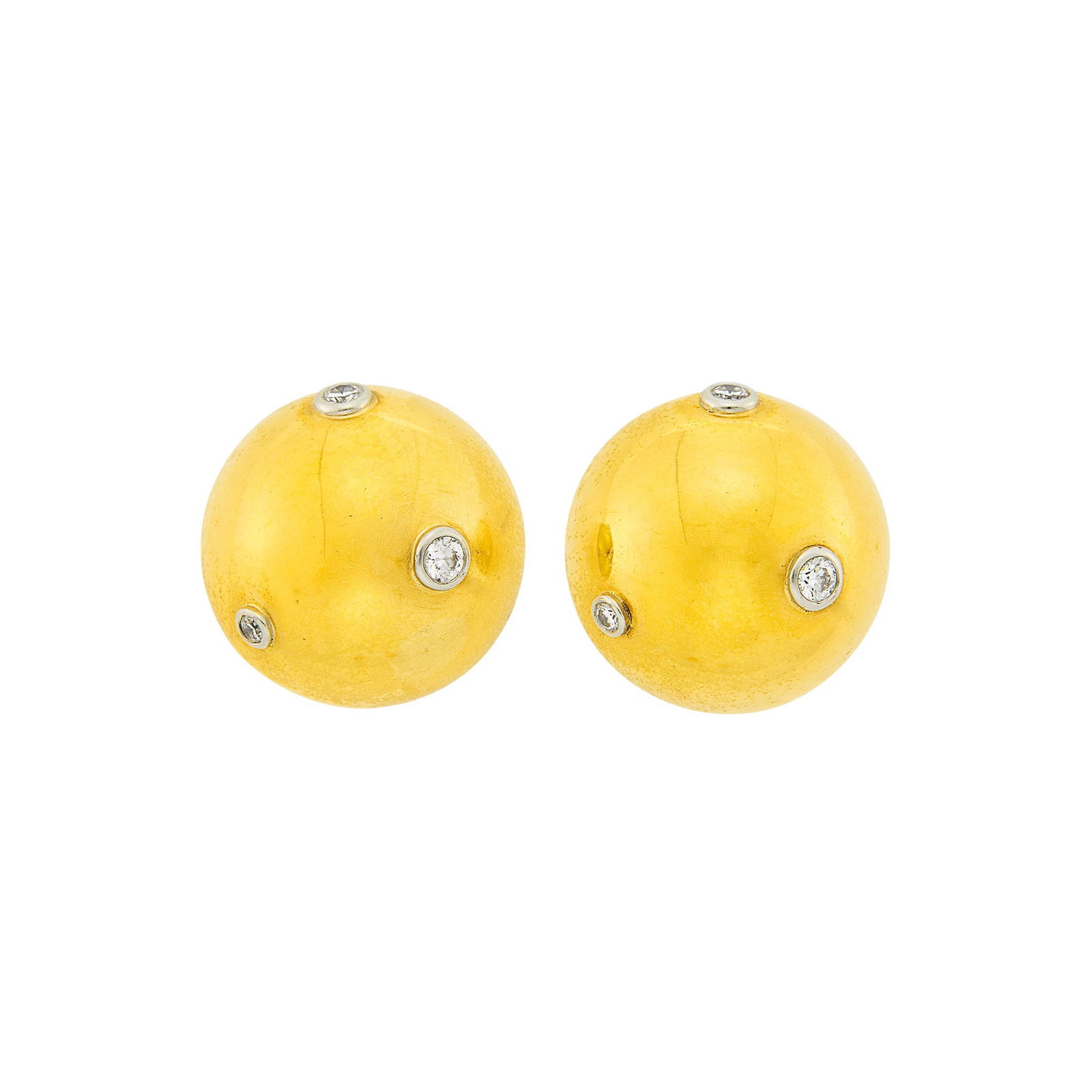 Tiffany & Co., Paloma Picasso Pair of Gold, Platinum and Diamond Dome Earclips: 18 kt., 6 collet-set round diamonds ap. .40 ct., signed Tiffany & Co., Paloma Picasso, 1980, ap. 12.5 dwts. Diamonds: G-H-VS. Clip-backs. Diameters 7/8 inch.