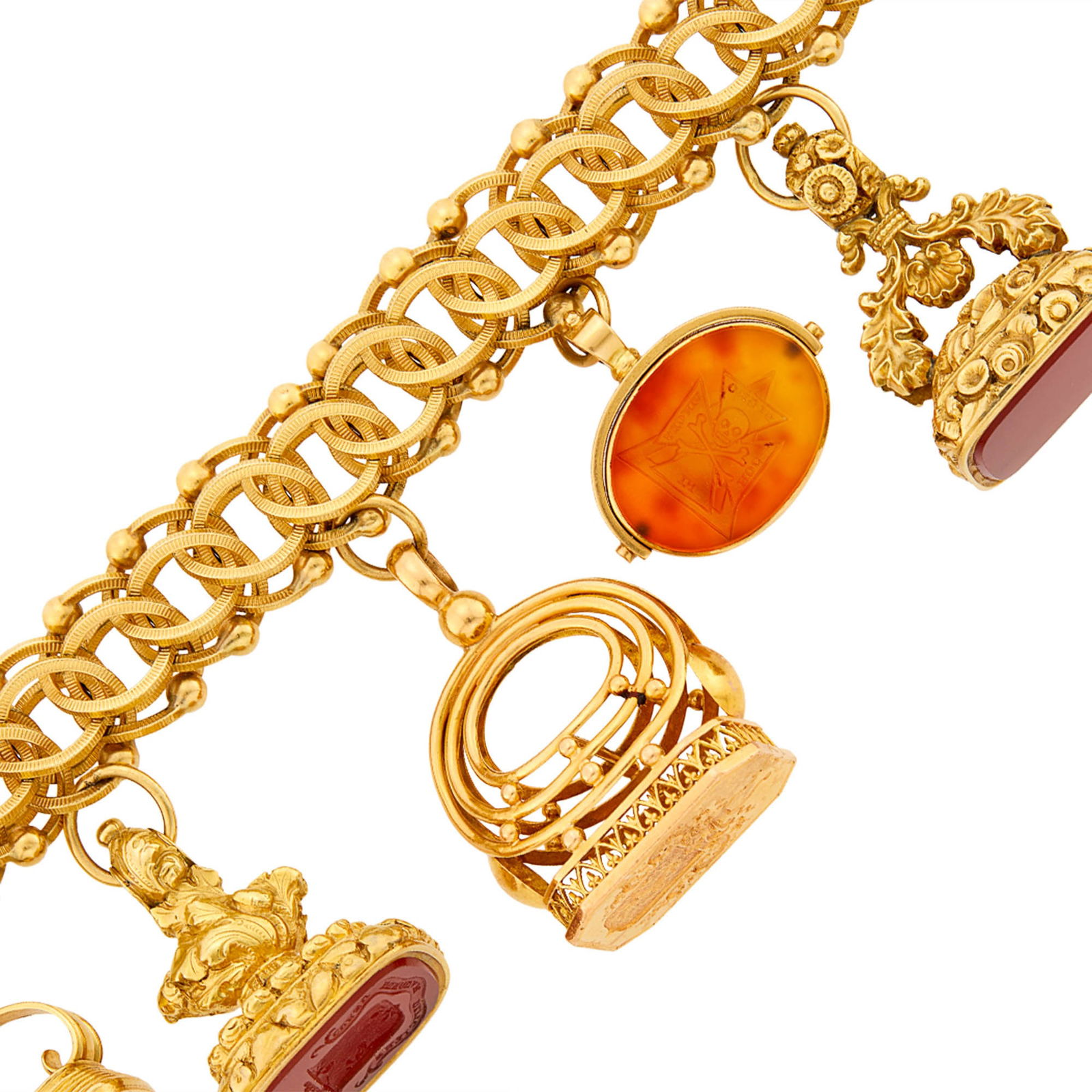 Gold and Antique Fob Charm Bracelet: 14 kt., interlocking ridged circle and polished ball links, six fobs, carnelian, citrine and wood, ap. 97.7 dwts. Length 6 inches. Large gold fob and citrine fob test as
