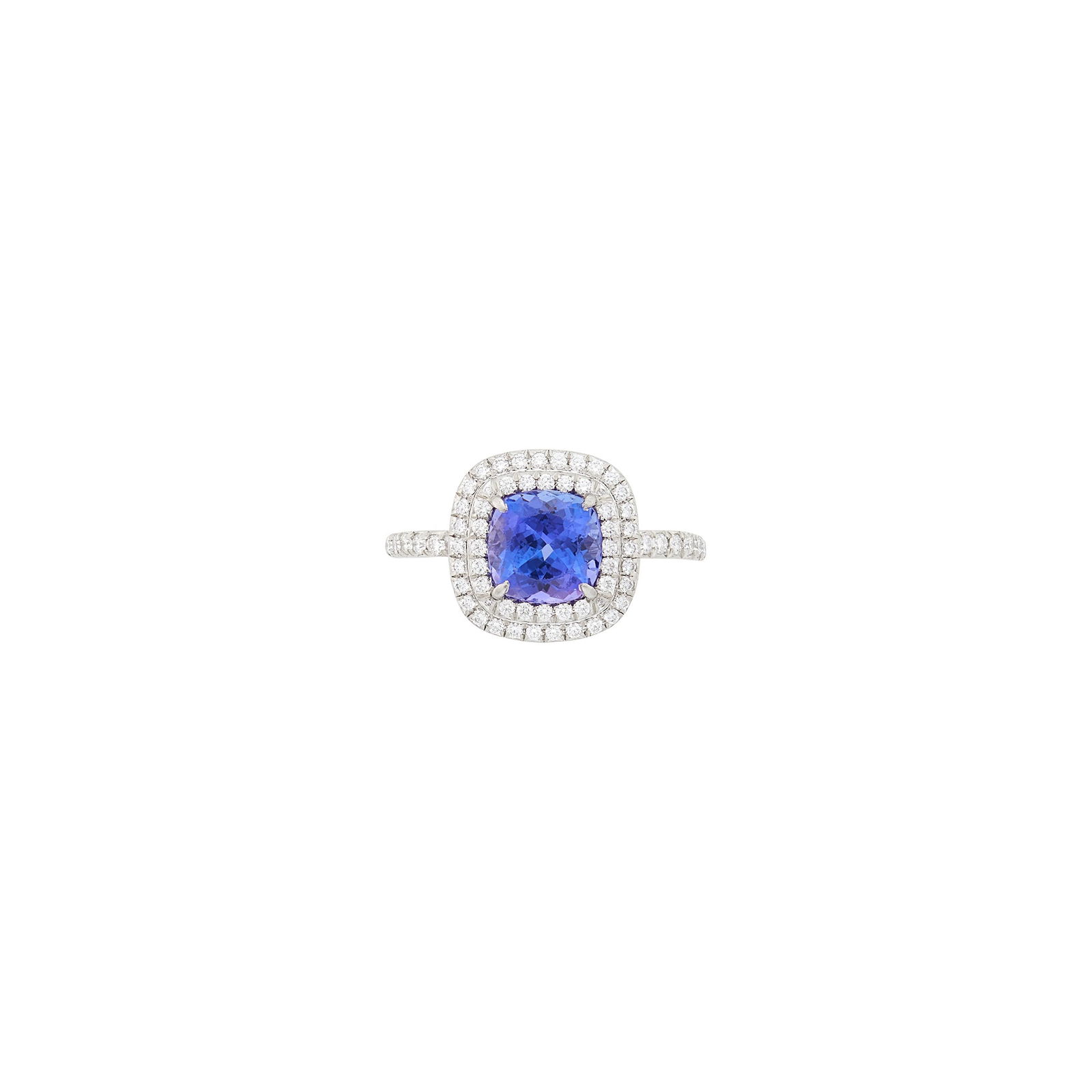 Tiffany & Co. Platinum, Tanzanite and Diamond 'Soleste' Ring: One cushion-shaped tanzanite ap. 2.00 cts., round diamonds ap. .60 ct., signed Tiffany & Co., ap. 4.6 dwts. Size 6 1/4. Tanzanite: bright medium violet, cleanish, minor abrasions at table edge, v