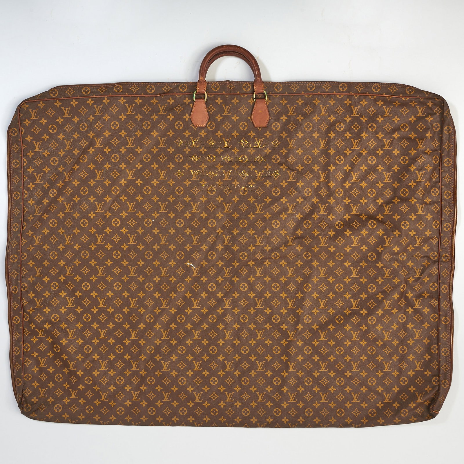 Louis Vuitton Monogram Canvas Leather Garment Bag: Length 44 inches. Monogram worn.