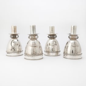 A Set of Four American Sterling Silver Candlesticks