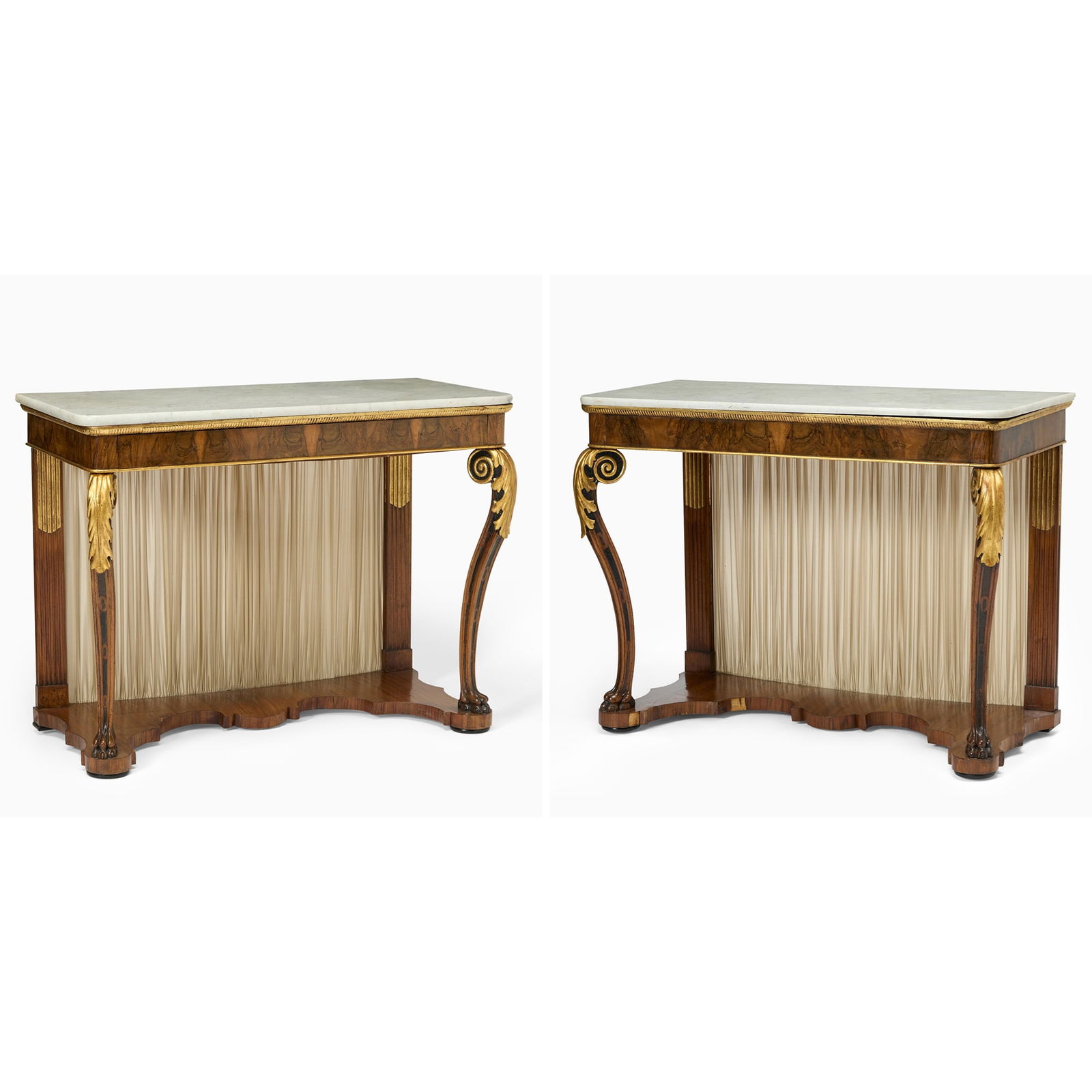Pair of Continental Neoclassical Parcel-Gilt Walnut Console Tables: Possibly Swedish, 19th century Each later white marble top with rounded corners above a frieze drawer resting on acanthus-carved cabriole legs and paw feet and fluted rear uprights, on a shaped plinth