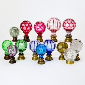 Group of Fourteen Glass and Brass Newel Finials