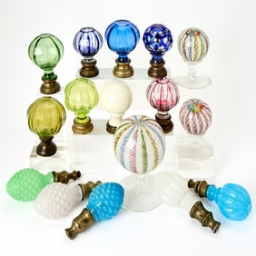Group of Sixteen Glass and Brass Finials