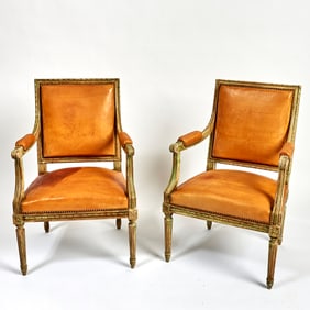 Pair of Louis XVI Leather Upholstered Painted Wood Fauteuils