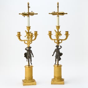 Pair of Empire Gilt and Patinated Bronze Figural Candelabra