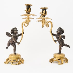 Pair of Louis XV Style Gilt and Patinated Bronze Figural Two-Light Candelabra