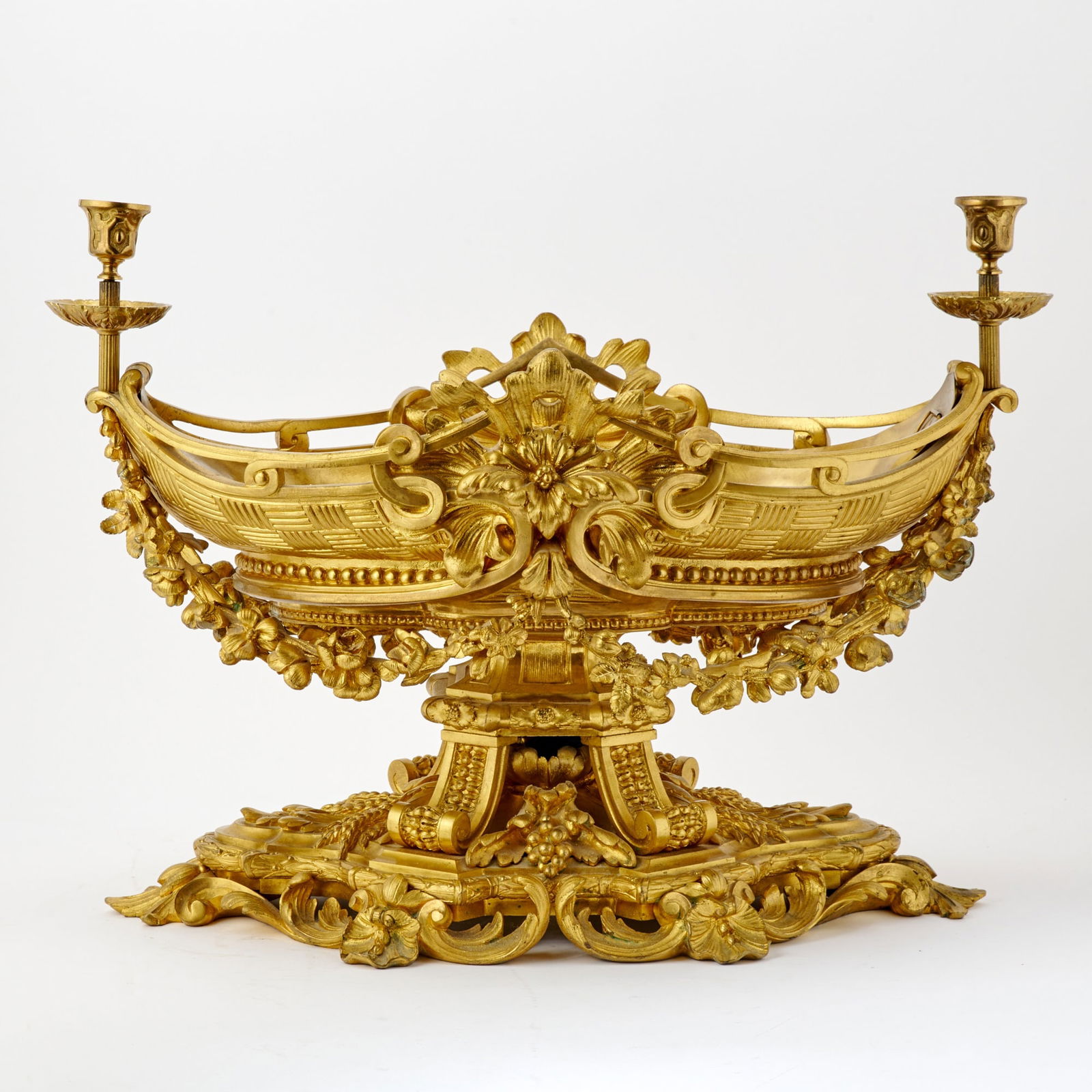 Large Napoleon III Gilt-Bronze Two-Light Oval Center Piece: Circa 1870 Height 17 1/4 inches (44 cm), width 24 inches (61 cm).