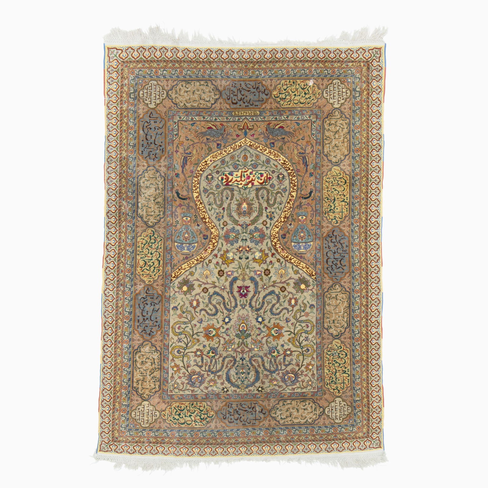 Hereke Silk Prayer Rug: West Turkey, Late 20th Century The slate grey field with an overall pattern of palmettes amongst cloud bands beneath a "Sultan's head" niche is within an inscription cartouche border. Signed "A.