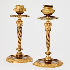 Pair of Louis XVI Style Gilt and Patinated Bronze Candlesticks