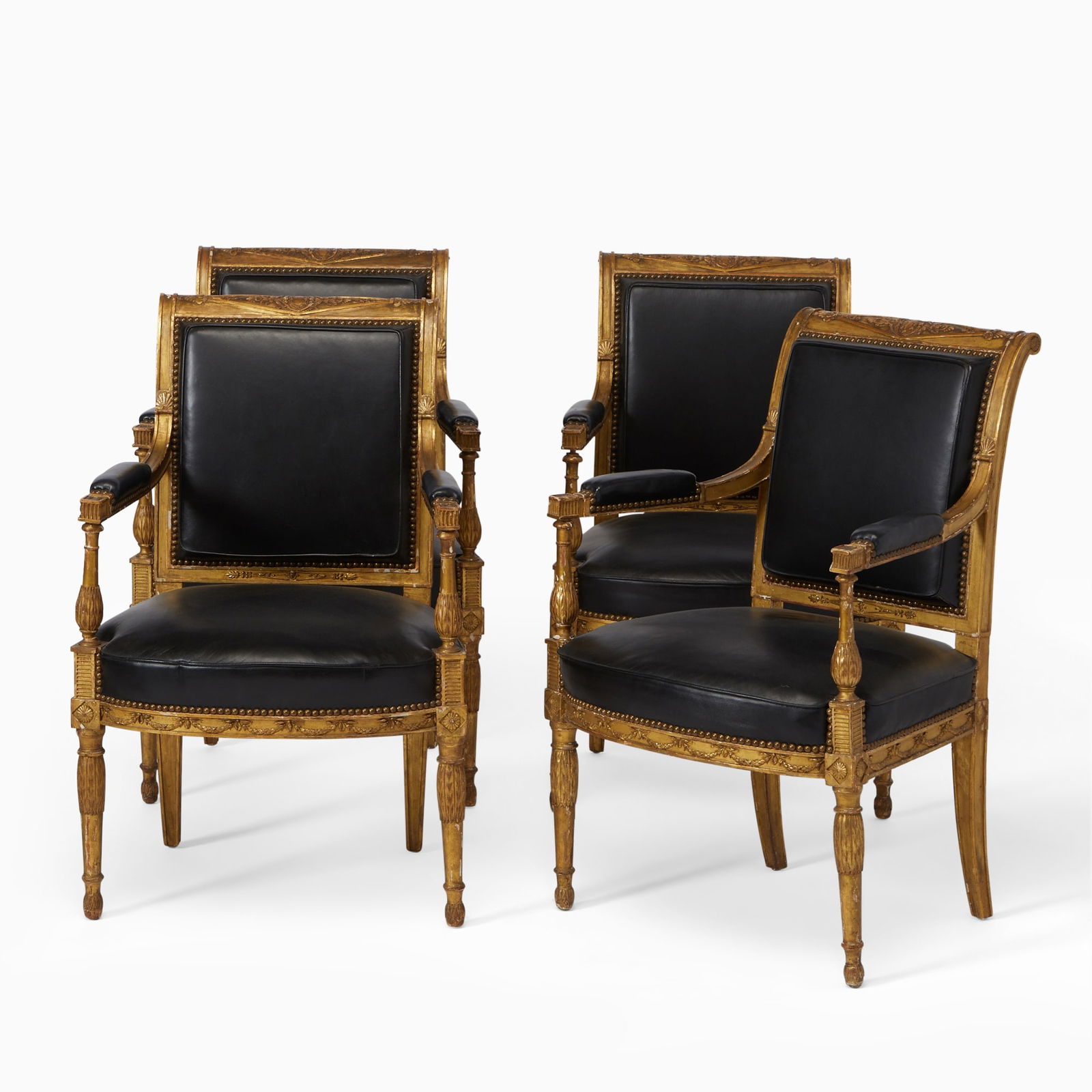 Set of Four Directoire Leather-Upholstered Carved and Giltwood Fauteuils (1 of 7)
